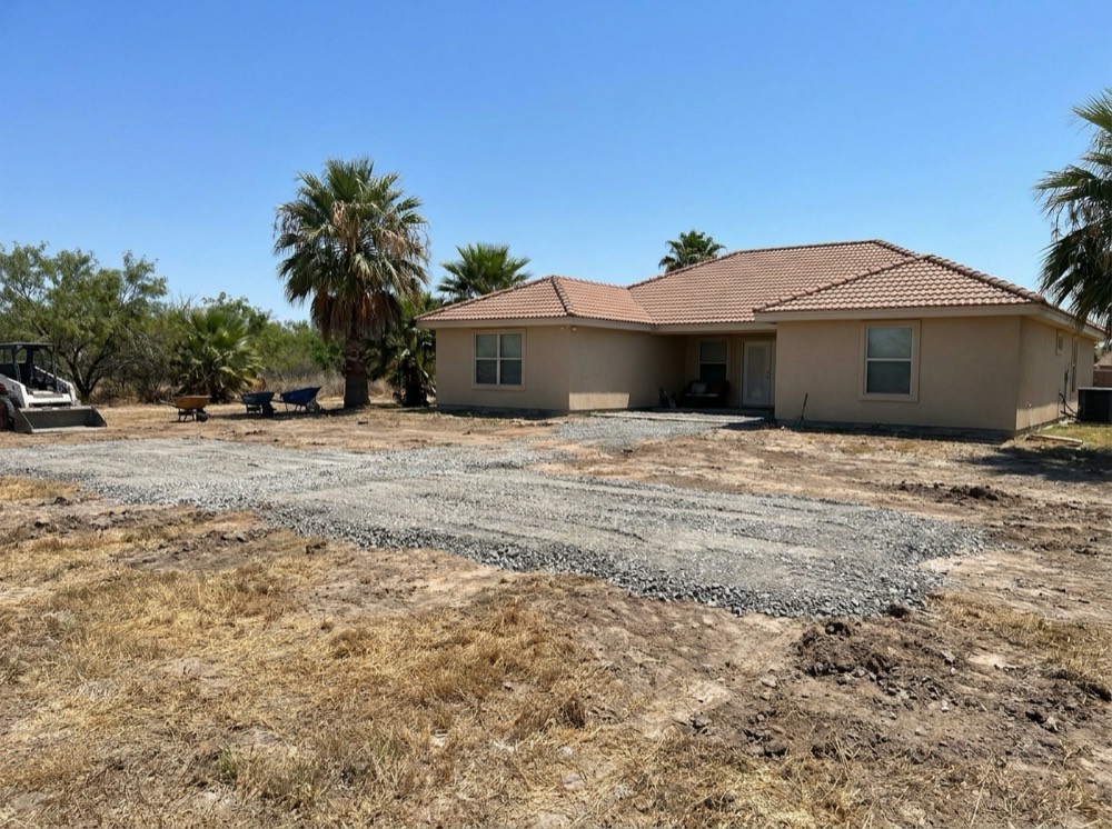 Base rock prepared before artificial turf installation in McAllen