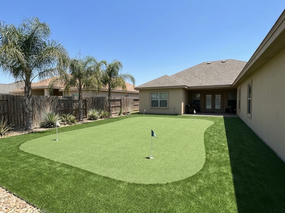 Backyard artificial putting green installed in Mission Texas